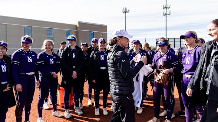 Kate Drohan celebrates 800th career win with team.
