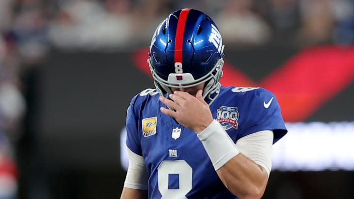 Sep 26, 2024; East Rutherford, New Jersey, USA; New York Giants quarterback Daniel Jones (8) reacts during the second quarter against the Dallas Cowboys at MetLife Stadium. Sep 26, 2024; East Rutherford, New Jersey, USA; New York Giants quarterback Daniel Jones (8) reacts during the second quarter against the Dallas Cowboys at MetLife Stadium.