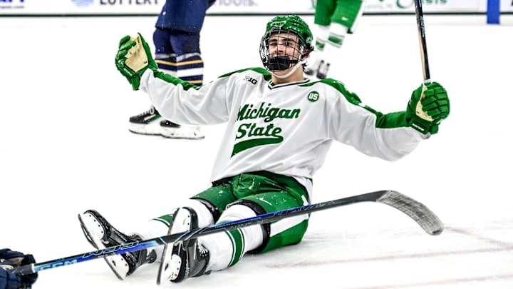 Michigan State's Porter Martone celebrates his empty net goal against Notre Dame during the third period on Thursday, Feb. 19, 2026, at the Munn Ice Arena in East Lansing.