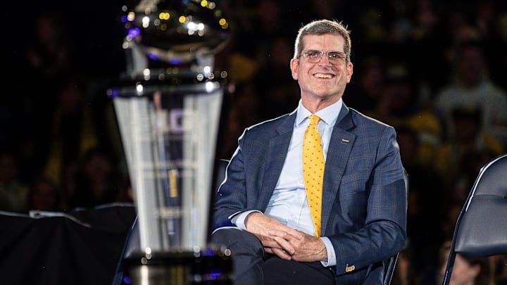 Michigan head coach Jim Harbaugh looks on during the national championship celebration at Crisler