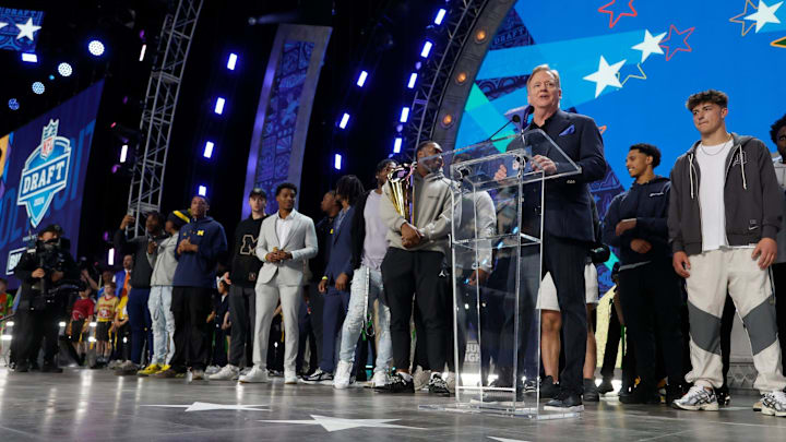 NFL commissioner Roger Goodell introduces members of the University of Michigan football team and their recent National Championship trophy before the start of the second round of 2024 NFL draft in Detroit.