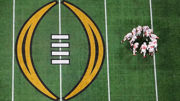 Jan 20, 2025; Atlanta, GA, USA; A general view as the Ohio State Buckeyes players huddle during the second quarter against the Notre Dame Fighting Irish the College Football Playoff National Championship game at Mercedes-Benz Stadium. Mandatory Credit: James Lang-Imagn Images