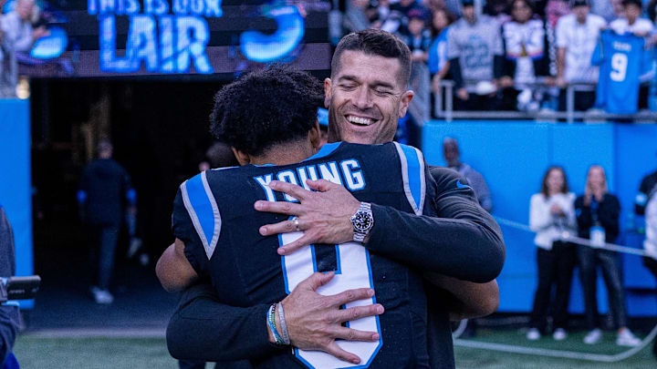 Nov 3, 2024; Charlotte, North Carolina, USA; Carolina Panthers head coach Dave Canales hugs quarterback Bryce Young (9) after getting the win against the New Orleans Saints at Bank of America Stadium. Mandatory Credit: Scott Kinser-Imagn Images Nov 3, 2024; Charlotte, North Carolina, USA; Carolina Panthers head coach Dave Canales hugs quarterback Bryce Young (9) after getting the win against the New Orleans Saints at Bank of America Stadium. Mandatory Credit: Scott Kinser-Imagn Images