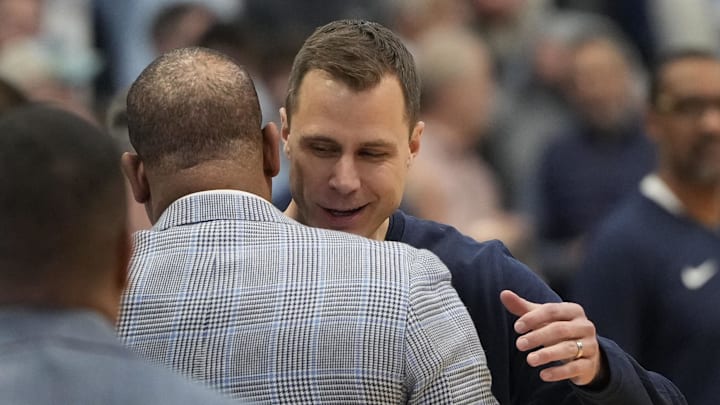 Duke basketball head coach Jon Scheyer and UNC basketball counterpart Hubert Davis