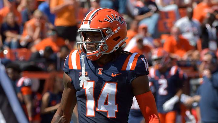 Sep 14, 2024; Champaign, Illinois, USA; Illinois Fighting Illini defensive back Xavier Scott (14) during the second half at Memorial Stadium. Mandatory Credit: Ron Johnson-Imagn Images Sep 14, 2024; Champaign, Illinois, USA; Illinois Fighting Illini defensive back Xavier Scott (14) during the second half at Memorial Stadium. Mandatory Credit: Ron Johnson-Imagn Images