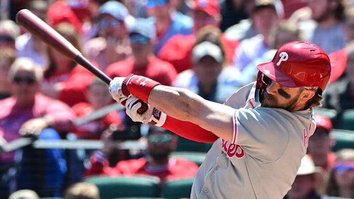 Apr 12, 2025; St. Louis, Missouri, USA; Philadelphia Phillies first baseman Bryce Harper (3) at bat against the St. Louis Cardinals at Busch Stadium. 