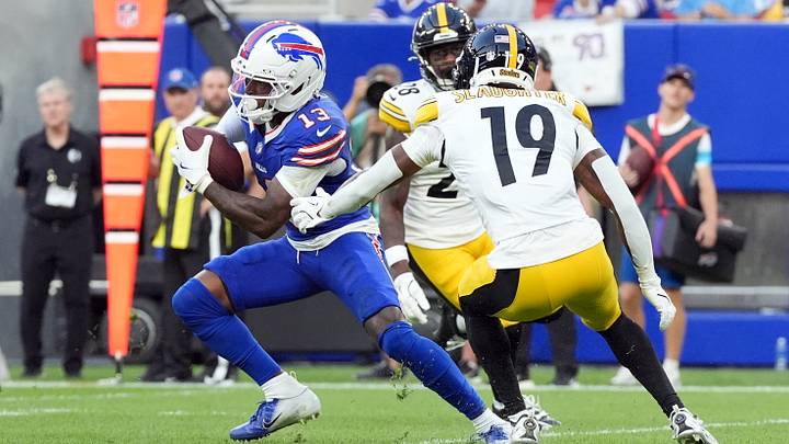 Aug. 27, 2026; Orchard Park, New York, USA; Buffalo Bills' wide receiver Skyler Bell (13) avoids a tackle by Pittsburgh Steelers' defensive back Doneiko Slaughter (19) during the first quarter of a preseason game at Highmark Stadium. Aug. 27, 2026; Orchard Park, New York, USA; Buffalo Bills' wide receiver Skyler Bell (13) avoids a tackle by Pittsburgh Steelers' defensive back Doneiko Slaughter (19) during the first quarter of a preseason game at Highmark Stadium.