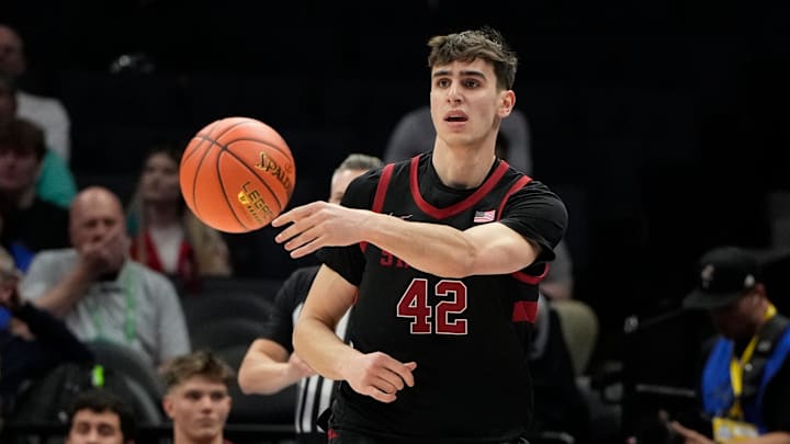 Mar 13, 2025; Charlotte, NC, USA; Stanford Cardinal forward Maxime Raynaud (42) passes the ball in the first half at Spectrum Center. Mar 13, 2025; Charlotte, NC, USA; Stanford Cardinal forward Maxime Raynaud (42) passes the ball in the first half at Spectrum Center.