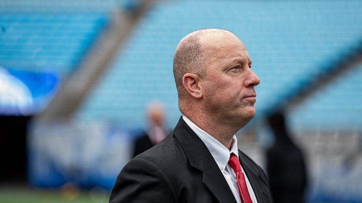 Louisville head coach Jeff Brohm looked up at the scoreboard as his Cardinals participated in a