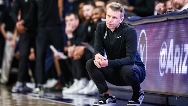 Jan 24, 2026; Tucson, Arizona, USA; West Virginia Mountaineers head coach Ross Hodge watches during the first half of the game against the Arizona Wildcats at McKale Memorial Center. Mandatory Credit: Aryanna Frank-Imagn Images
