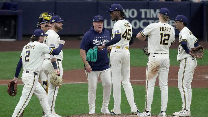 Milwaukee Brewers pitcher Abner Uribe (45) talks to Milwaukee Brewers manager Pat Murphy before leaving the game during the eighth inning the during Game 2 of the World Series against the Tampa Bay Rays at American Family Field on Oct 24, 2026.
