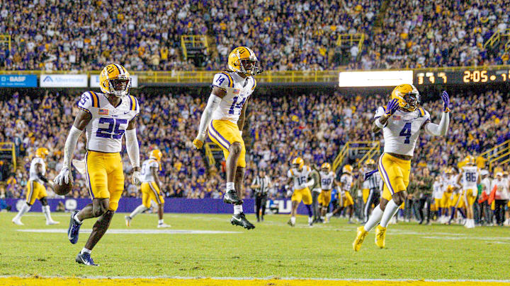 Nov 11, 2023; Baton Rouge, Louisiana, USA; LSU Tigers safety Javien Toviano (25) recovers a fumble