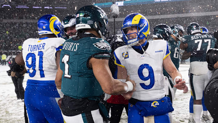 Jan 19, 2025; Philadelphia, Pennsylvania, USA; Philadelphia Eagles quarterback Jalen Hurts (1) and Los Angeles Rams quarterback Matthew Stafford (9) shake hands after a 2025 NFC divisional round game at Lincoln Financial Field. Mandatory Credit: Bill Streicher-Imagn Images