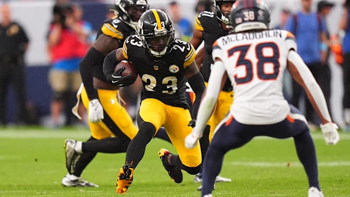 Sep 15, 2024; Denver, Colorado, USA; Pittsburgh Steelers safety Damontae Kazee (23) returns a intercepted football in the fourth quarter against the Denver Broncos at Empower Field at Mile High. Mandatory Credit: Ron Chenoy-Imagn Images
