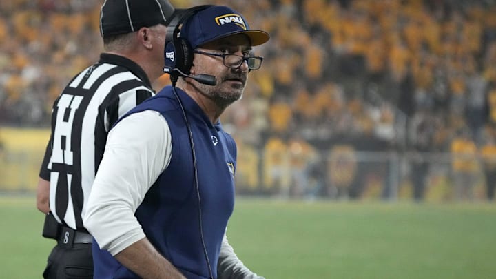 Northern Arizona Lumberjacks head coach Brian Wright reacts to a call during a football game against the Arizona State Sun Devils
