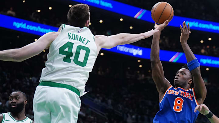 New York Knicks forward OG Anunoby (8) shoots the ball against Boston Celtics center Luke Kornet (40) in the second quarter during game one of the second round for the 2025 NBA Playoffs at TD Garden.