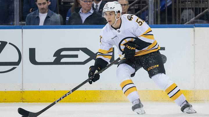 Sep 23, 2025; New York, New York, USA; Boston Bruins center Matthew Poitras (51) carries the puck during the first period of a preseason game against the New York Rangers at Madison Square Garden. Mandatory Credit: Vincent Carchietta-Imagn Images