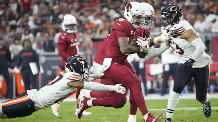 James Conner breaks tackles Sunday at Glendale, Az as the Bears defense struggled in all areas of a 29-9 loss.