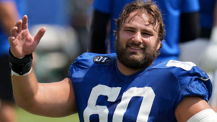 Indianapolis Colts center Tanor Bortolini (60) warms up Thursday, Aug. 14, 2025, at a joint practice with the Green Bay Packers during training camp at Grand Park in Westfield.