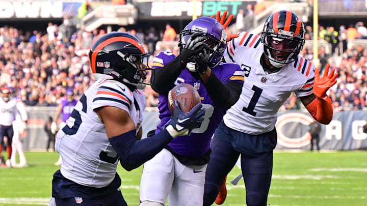 Safety Jonathan Owens and Jaylon Johnson have Justin Jefferson bottled up in Chicago but a pass interference flag wipes out an interception made by Owens. Safety Jonathan Owens and Jaylon Johnson have Justin Jefferson bottled up in Chicago but a pass interference flag wipes out an interception made by Owens.