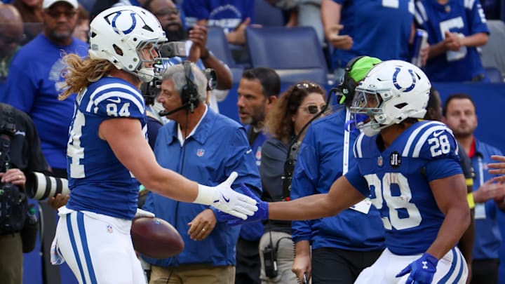 Oct 12, 2025; Indianapolis, Indiana, USA; Indianapolis Colts tight end Tyler Warren (84) celebrates with running back Jonathan Taylor (28) after a reception against the Arizona Cardinals during the first quarter of the game at Lucas Oil Stadium. Mandatory Credit: Trevor Ruszkowski-Imagn Images Oct 12, 2025; Indianapolis, Indiana, USA; Indianapolis Colts tight end Tyler Warren (84) celebrates with running back Jonathan Taylor (28) after a reception against the Arizona Cardinals during the first quarter of the game at Lucas Oil Stadium. Mandatory Credit: Trevor Ruszkowski-Imagn Images