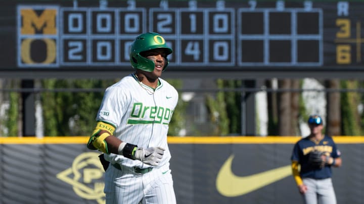  Jacob Walsh bombed a pair of home runs for the Ducks and Mason Neville led off the first with another, but Oregon pitching plunked seven batters and gave up 14 runs to the No. 10 Bruins.