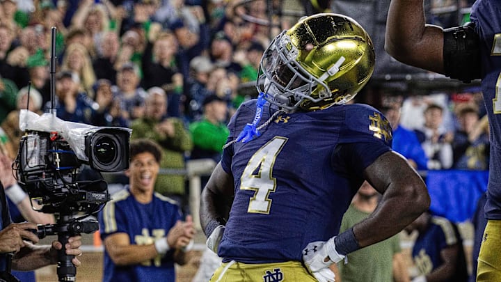 Oct 18, 2025; South Bend, Indiana, USA; Notre Dame Fighting Irish running back Jeremiyah Love (4) celebrates his touchdown in the first half against the Southern California Trojans at Notre Dame Stadium. Oct 18, 2025; South Bend, Indiana, USA; Notre Dame Fighting Irish running back Jeremiyah Love (4) celebrates his touchdown in the first half against the Southern California Trojans at Notre Dame Stadium.