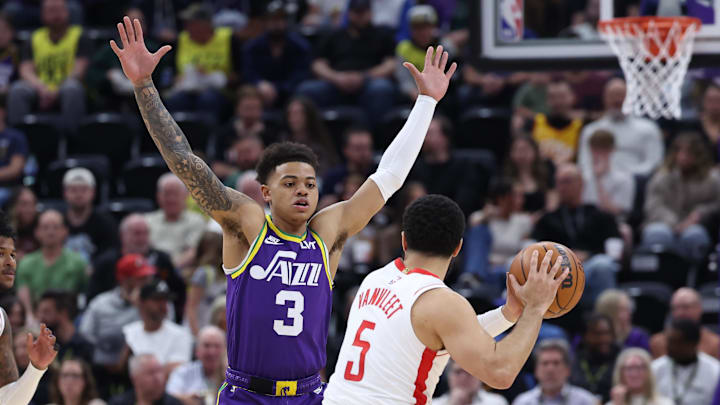 Apr 11, 2024; Salt Lake City, Utah, USA; Utah Jazz guard Keyonte George (3) defends Houston Rockets
