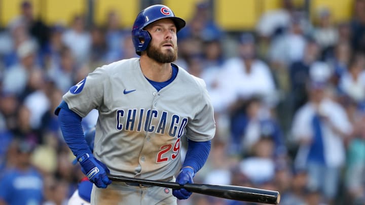 Apr 13, 2025; Los Angeles, California, USA; Chicago Cubs first base Michael Busch (29) watches after hitting a solo home run against the Los Angeles Dodgers during the sixth inning during the sixth inning of the game at Dodger Stadium. 