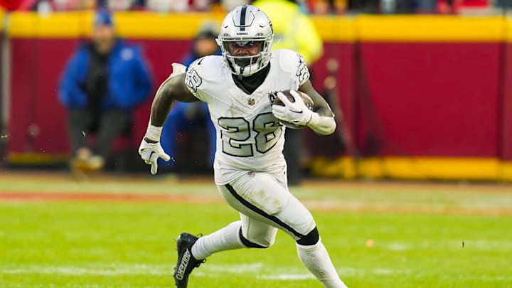 Nov 29, 2024; Kansas City, Missouri, USA; Las Vegas Raiders running back Sincere McCormick (28) during the second half against the Kansas City Chiefs at GEHA Field at Arrowhead Stadium. Mandatory Credit: Jay Biggerstaff-Imagn Images