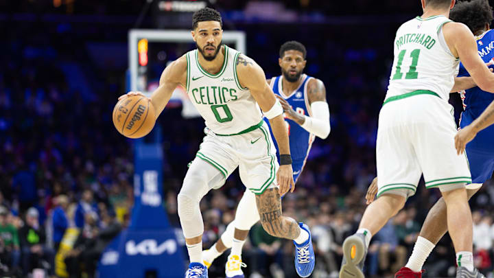 Feb 20, 2025; Philadelphia, Pennsylvania, USA; Boston Celtics forward Jayson Tatum (0) dribbles the ball against the Philadelphia 76ers during the second quarter at Wells Fargo Center. Mandatory Credit: Bill Streicher-Imagn Images