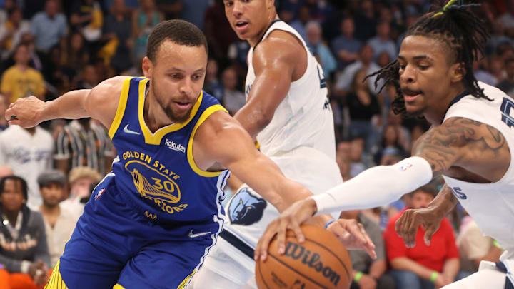 Memphis Grizzlies Ja Morant (12) steals the ball from Golden State Warriors guard Stephen Curry (30) during game one of the second round for the 2022 NBA playoffs at FedExForum. Mandatory Credit: Joe Rondone-Imagn Images Memphis Grizzlies Ja Morant (12) steals the ball from Golden State Warriors guard Stephen Curry (30) during game one of the second round for the 2022 NBA playoffs at FedExForum. Mandatory Credit: Joe Rondone-Imagn Images