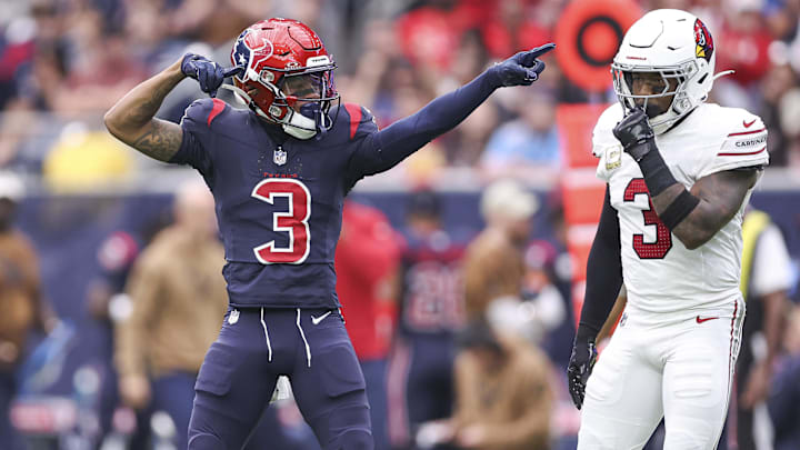 Houston Texans wide receiver Tank Dell (3) signals a first down.