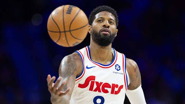 Mar 1, 2025; Philadelphia, Pennsylvania, USA; Philadelphia 76ers forward Paul George (8) catches a ball against the Golden State Warriors during the third quarter at Wells Fargo Center. Mandatory Credit: Bill Streicher-Imagn Images
