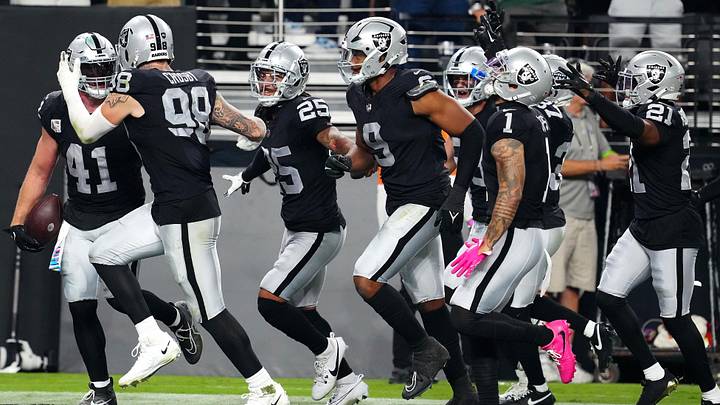 Oct 9, 2023; Paradise, Nevada, USA; Las Vegas Raiders linebacker Robert Spillane (41) celebrates with team mates after making an interception against the Green Bay Packers during the second quarter at Allegiant Stadium. Mandatory Credit: Stephen R. Sylvanie-USA TODAY Sports Oct 9, 2023; Paradise, Nevada, USA; Las Vegas Raiders linebacker Robert Spillane (41) celebrates with team mates after making an interception against the Green Bay Packers during the second quarter at Allegiant Stadium. Mandatory Credit: Stephen R. Sylvanie-USA TODAY Sports