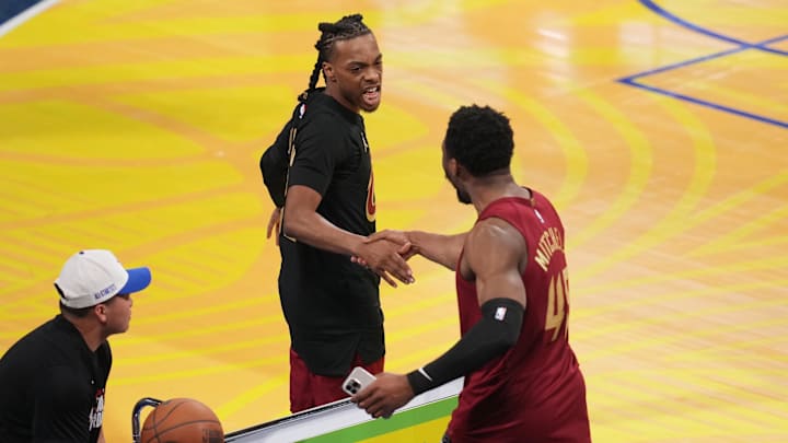 Feb 15, 2025; San Francisco, CA, USA; Cleveland Cavaliers guard Darius Garland (10) reacts with guard Donovan Mitchell (45) during the three-point contest during All Star Saturday Night ahead of the 2025 NBA All Star Game at Chase Center. Mandatory Credit: Cary Edmondson-Imagn Images