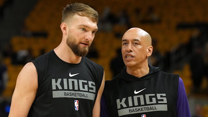 Apr 23, 2023; San Francisco, California, USA; Sacramento Kings forward Domantas Sabonis (left) and assistant coach Doug Christie (right) talk before game four of the 2023 NBA playoffs against the Golden State Warriors at Chase Center. Mandatory Credit: Darren Yamashita-Imagn Images