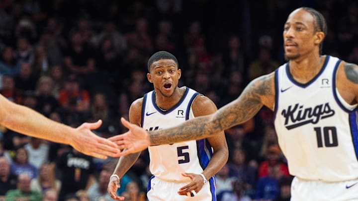 Sacramento Kings guard De'Aaron Fox (5) reacts after guard-forward DeMar DeRozan (10) scores in the second half during a game against the Phoenix Suns at Footprint Center. Mandatory Credit: Allan Henry-Imagn Images Sacramento Kings guard De'Aaron Fox (5) reacts after guard-forward DeMar DeRozan (10) scores in the second half during a game against the Phoenix Suns at Footprint Center. Mandatory Credit: Allan Henry-Imagn Images