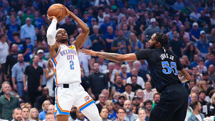 May 18, 2024; Dallas, Texas, USA; Oklahoma City Thunder guard Shai Gilgeous-Alexander (2) shoots over Dallas Mavericks forward Derrick Jones Jr. (55) during the first quarter in game six of the second round of the 2024 NBA playoffs at American Airlines Center. Mandatory Credit: Kevin Jairaj-Imagn Images