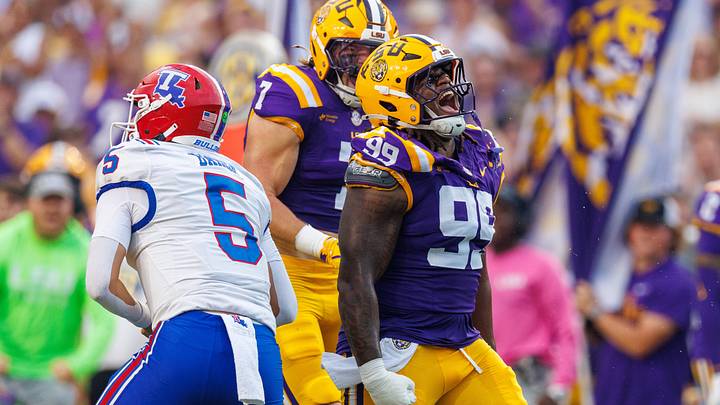 Sep 12, 2026; Baton Rouge, Louisiana, USA; LSU Tigers defensive tackle Deuce Geralds (99) reacts to sacking Louisiana Tech Bulldogs quarterback Blake Baker (5) during the first half at Tiger Stadium. Mandatory Credit: Stephen Lew-Imagn Images Sep 12, 2026; Baton Rouge, Louisiana, USA; LSU Tigers defensive tackle Deuce Geralds (99) reacts to sacking Louisiana Tech Bulldogs quarterback Blake Baker (5) during the first half at Tiger Stadium. Mandatory Credit: Stephen Lew-Imagn Images
