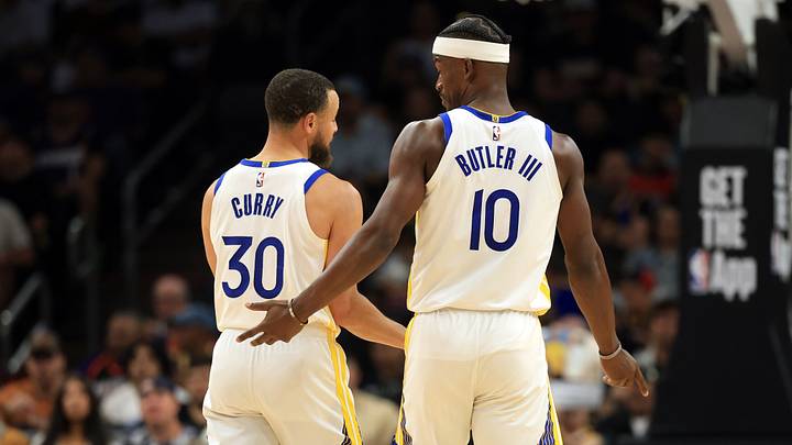 Apr 8, 2025; Phoenix, Arizona, USA; Golden State Warriors forward Jimmy Butler III (10) with guard Stephen Curry (30) against the Phoenix Suns at Footprint Center. Mandatory Credit: Mark J. Rebilas-Imagn Images