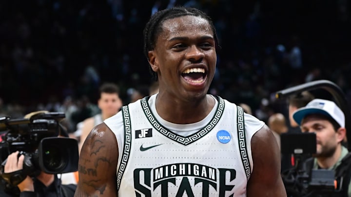 Mar 23, 2025; Cleveland, OH, USA; Michigan State Spartans forward Coen Carr (55) celebrates after the game against the New Mexico Lobos during the NCAA Tournament Second Round at Rocket Arena. Mandatory Credit: Ken Blaze-Imagn Images