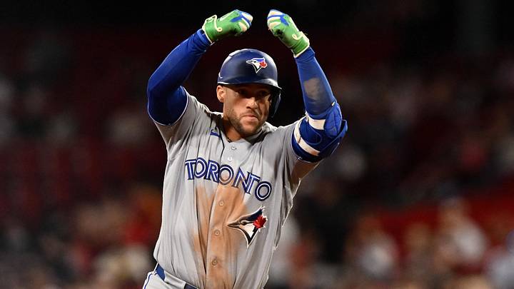 Blue Jays designated hitter George Springer (4) reacts after hitting a home run against the Boston Red Sox during the ninth inning at Fenway Park. Blue Jays designated hitter George Springer (4) reacts after hitting a home run against the Boston Red Sox during the ninth inning at Fenway Park.