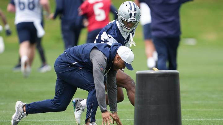 Dallas Cowboys cornerback Caleb Downs and defensive coordinator Christian Parker. Dallas Cowboys cornerback Caleb Downs and defensive coordinator Christian Parker.