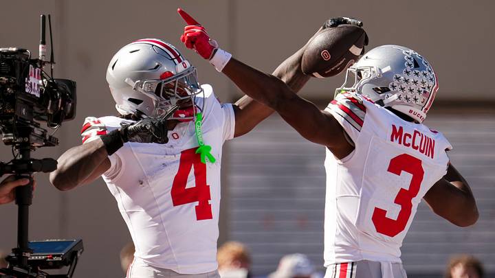 Ohio State Buckeyes wide receiver Jeremiah Smith (4) celebrates a touchdown with with wide receiver Devin McCuin (3) during the NCAA football game against the Indiana Hoosiers at Memorial Stadium Stadium in Bloomington, Ind. on Oct. 17, 2026.
