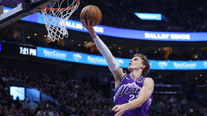 Jan 3, 2024; Salt Lake City, Utah, USA; Utah Jazz forward Lauri Markkanen (23) lays the ball up against the Detroit Pistons during the first quarter at Delta Center. Mandatory Credit: Rob Gray-Imagn Images
