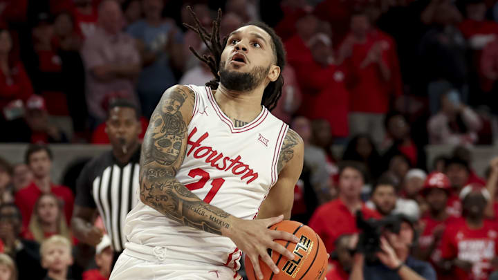 Nov 3, 2025; Houston, Texas, USA; Houston Cougars guard Emanuel Sharp (21) drives to the basket during the first half against the Lehigh Mountain Hawks at Fertitta Center. Mandatory Credit: Maria Lysaker-Imagn Images Nov 3, 2025; Houston, Texas, USA; Houston Cougars guard Emanuel Sharp (21) drives to the basket during the first half against the Lehigh Mountain Hawks at Fertitta Center. Mandatory Credit: Maria Lysaker-Imagn Images