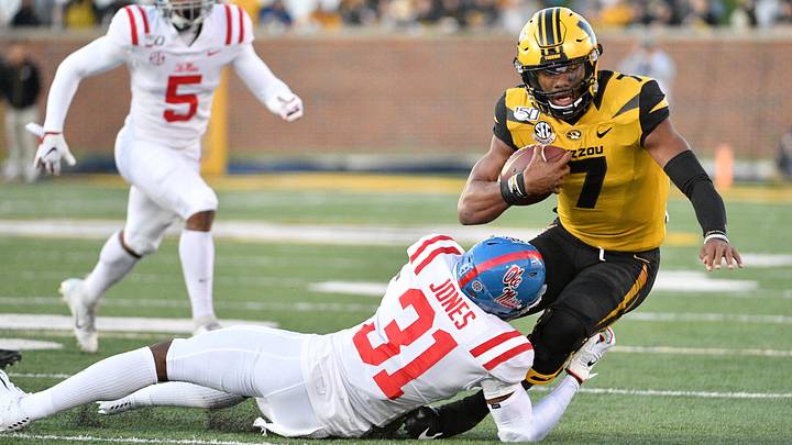 Missouri Tigers running back Larry Rountree III is tackled by Mississippi Rebels defensive back Jaylon Jones during the first half at Memorial Stadium.