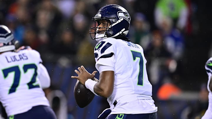 Dec 26, 2024; Chicago, Illinois, USA; Seattle Seahawks quarterback Geno Smith (7) looks to pass against the Chicago Bears during the first quarter at Soldier Field. Mandatory Credit: Daniel Bartel-Imagn Images