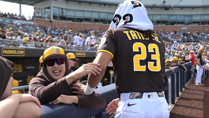 Feb 23, 2026; Peoria, Arizona, USA;  San Diego Padres third baseman Sung-Mun Song (24) and San Diego Padres right fielder Fernando Tatis Jr. (23) share a laugh in the dugout during the game against the Milwaukee Brewers at Peoria Sports Complex. Mandatory Credit: Jayne Kamin-Oncea-Imagn Images